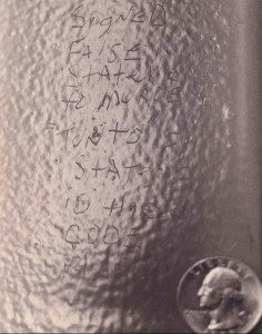 Scratched into a metal bench by torture victim Aaron Patterson: "Aaron 4/30 I lie about murders / Police threaten me with violence / Slapped and suffocated me with plastic."