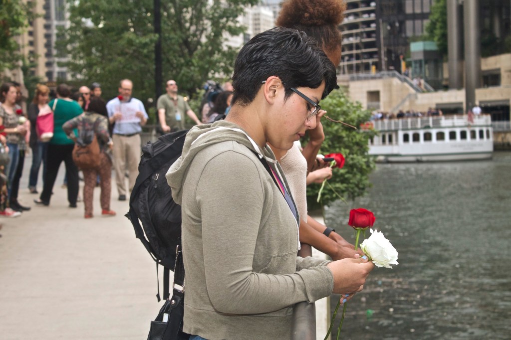 Mourners gathered beside the Chicago River last week to grieve for those killed during an attack on the Emanuel African Methodist Episcopal Church in Charleston, South Carolina. (Photo: Bob Simpson)