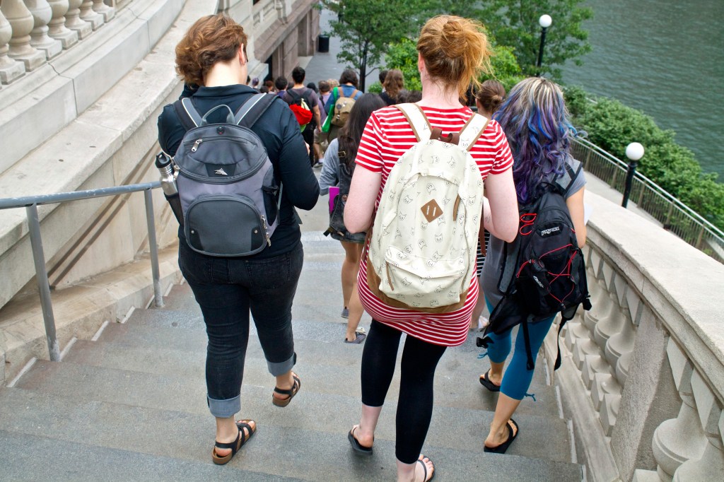 Mourners make their way to riverside to hold space in remembrance of the fallen. (Photo: Bob Simpson)